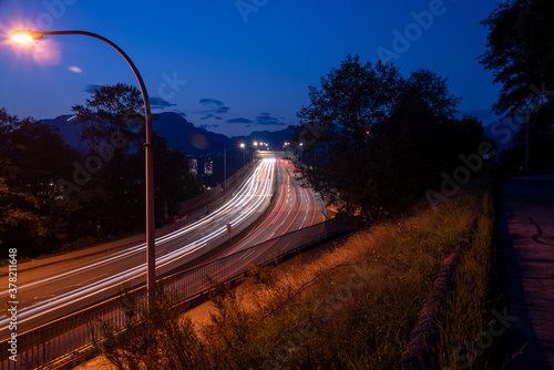 Long exposure picture of light trails on the second narrow bridge. Vancouver BC Canada 