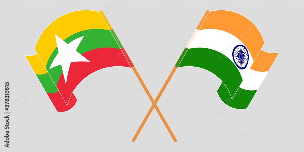 Crossed and waving flags of Myanmar and India Crossed and waving flags of Myanmar and India