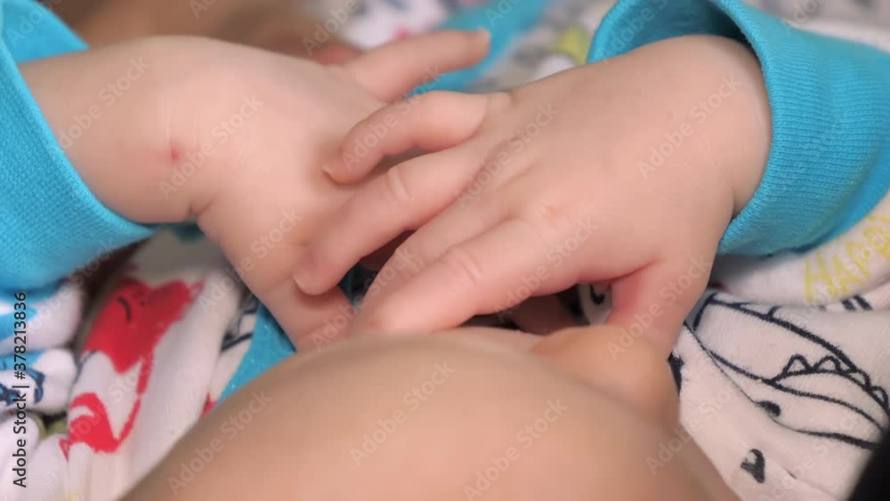 Two hands of the baby while sleeping so tightly.4K Two hands of the baby while sleeping so tightly.4K
