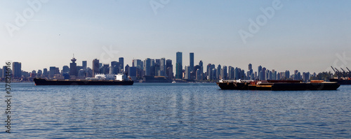 ships before the skyline of vancouver
