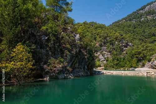 Wallpaper Mural View of turquoise lake in canyon Goynuk, located inside the Beydaglari Coastal National Park, Kemer district in Antalya Province, Turkey. August 2020 Torontodigital.ca