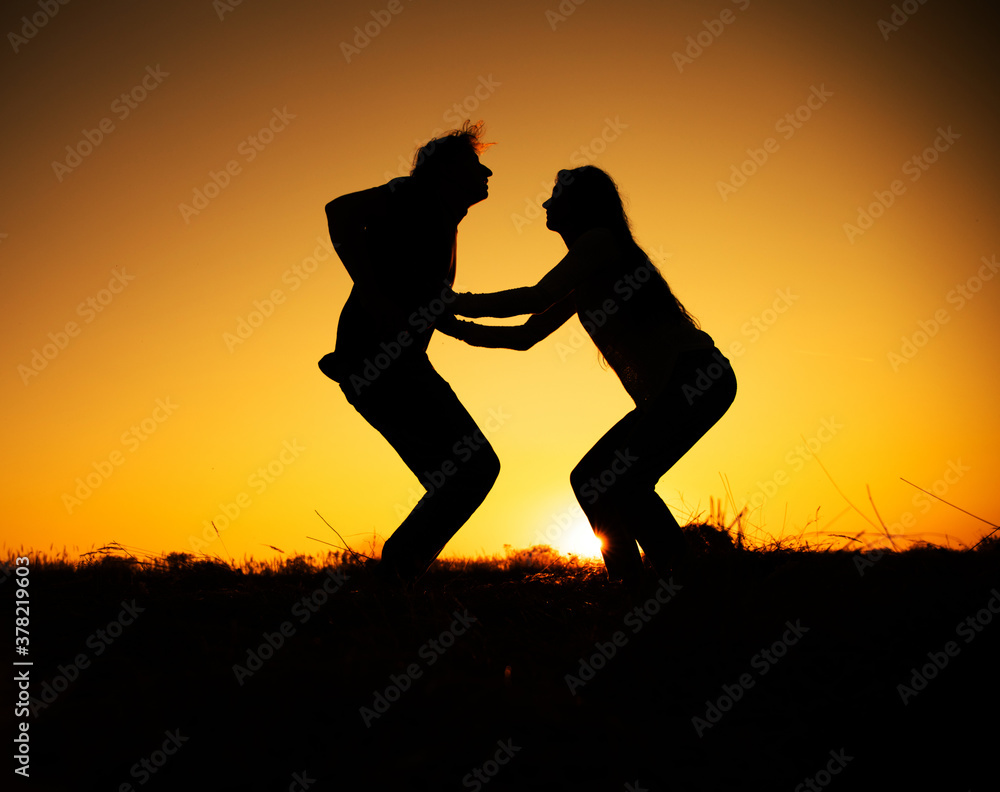 Couple in love silhouette during sunset. Couple in love. Sensual. 
