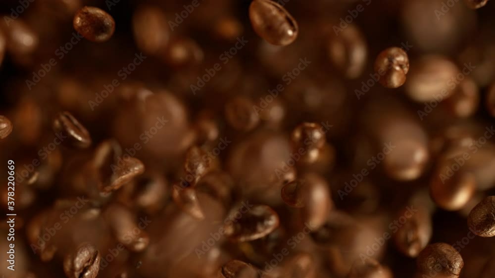 Super slow motion of flying coffee beans. Filmed on high speed cinema camera, 1000 fps. 4K Super slow motion of flying coffee beans. Filmed on high speed cinema camera, 1000 fps. 4K
