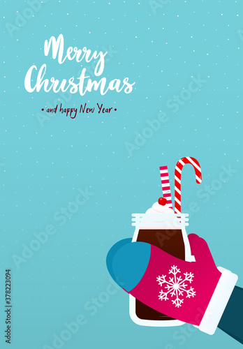 Merry Christmas greeting card. Girl in red mittens is holding big glass mug with hot chocolate on blue snowy backdrop. Vector illustration in flat design 