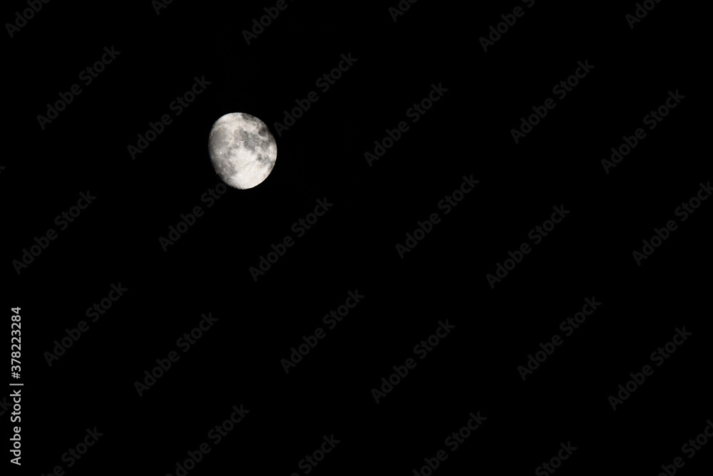 Bright moon during a dark, almost full night, with copy space. Bright moon during a dark, almost full night, with copy space.