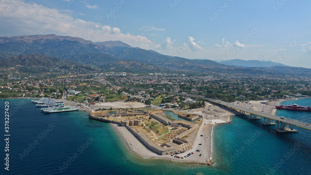 Aerial drone photo of world famous cable suspension bridge of Rio - Antirio Harilaos Trikoupis, crossing Corinthian Gulf, mainland Greece to Peloponnese, Patras