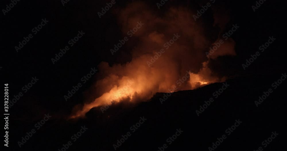Magma illuminating night sky, wide Magma illuminating night sky, wide