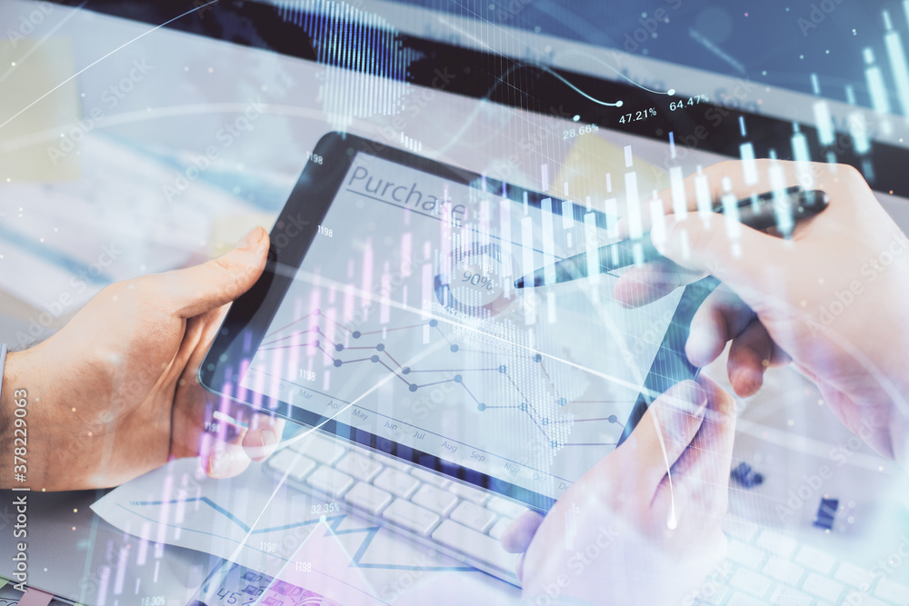 Double exposure of man's hands holding and using a phone and financial chart drawing. Market analysis concept. Double exposure of man's hands holding and using a phone and financial chart drawing. Market analysis concept.