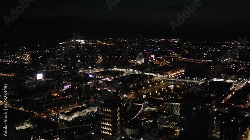 Wallpaper Mural Panoramic view at night with city lights on dark sky background. Stock footage. View from the plane porthole on a big city with beautiful lights, night life concept. Torontodigital.ca