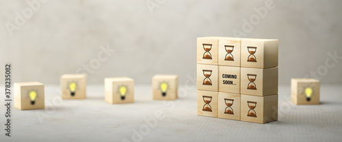 cubes showing a brainstorming session on paper surface and concrete background