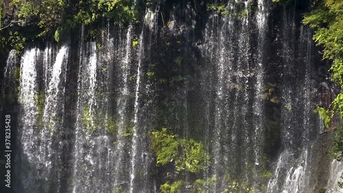 View of the falling water from the Shiraito falls in Japan photo