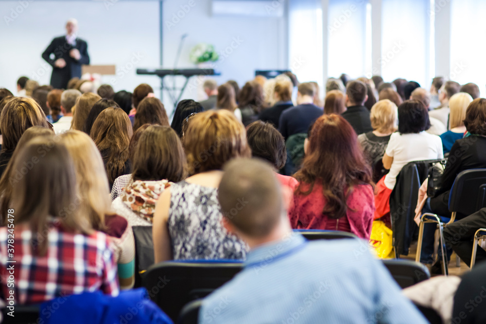 Conference Ideas. Male Lecturer Speaking In Front of the Group of People. Conference Ideas. Male Lecturer Speaking In Front of the Group of People.