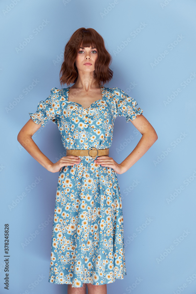 Woman portrait Look Forward hands on the belt summer clothes Woman portrait Look Forward hands on the belt summer clothes