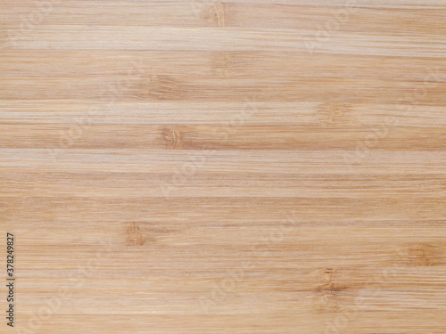 Close up of Natural light brown planks bamboo wood texture table background. Abstract surface rough pattern. Design in your work backdrop and decoration. Concept blank copy space for text.