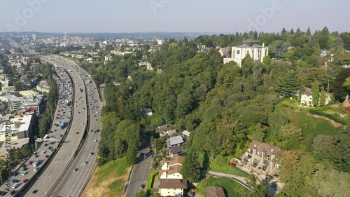 Aerial / drone footage of Saint Mark's Episcopal Cathedral on Capitol Hill, Eastlake, Capitol Hill downtown Seattle with smoke in the air from the Washington State wildfires in Seattle, Washington photo