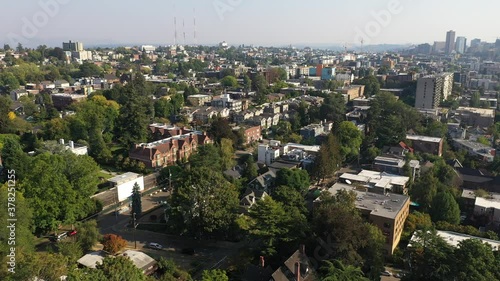 Aerial / drone footage of the upscale Capitol Hill neighborhood, Eastlake, Capitol Hill downtown Seattle with smoke in the air from the Washington State wildfires in Seattle, Washington photo