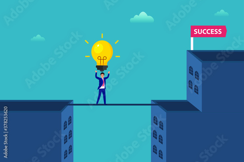 Business vector concept: Businessman crossing a bridge while carrying a light bulb between the office buildings towards success