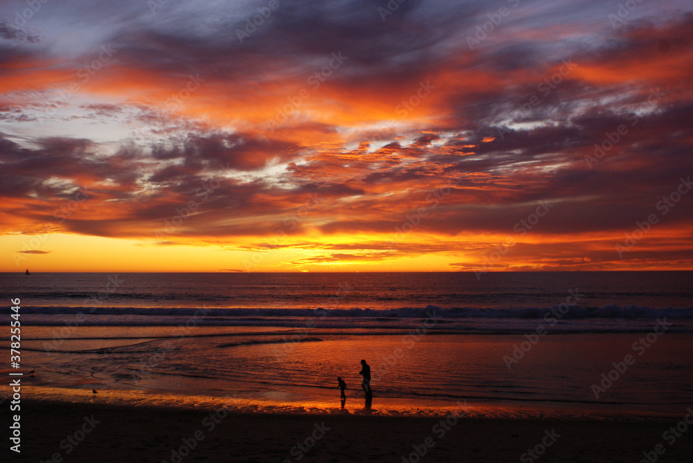 Father and child at suset