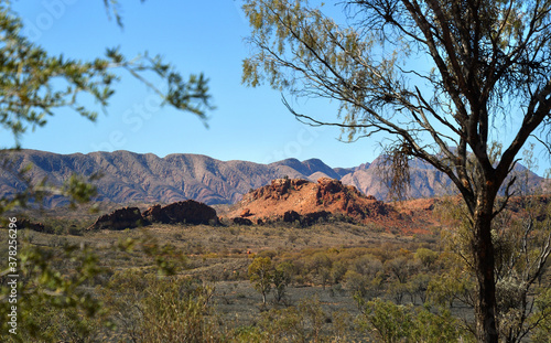 Mountain ranges of outback Australia surrounded by bushland and arid desert country.