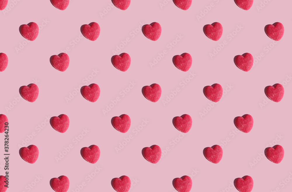 pattern made with red heart on pink background