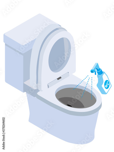 洋式トイレの便器に洗剤をスプレーする