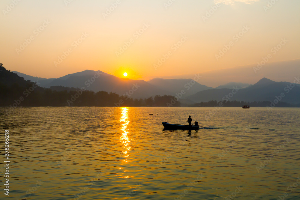Sunrise in the morning and small boat at Koh Chang Sunrise in the morning and small boat at Koh Chang