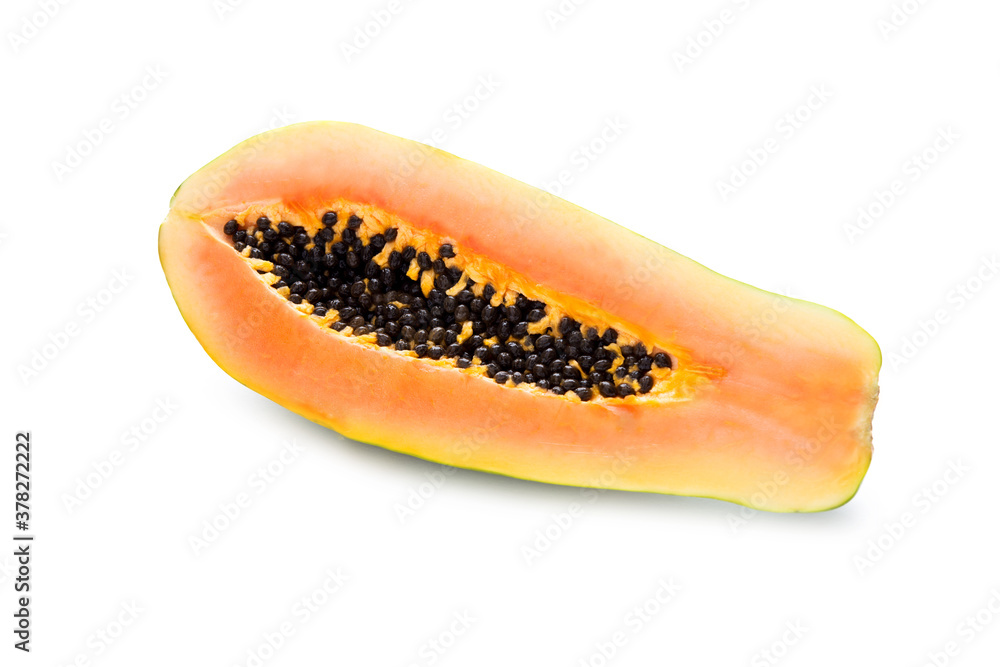 Half of a fresh papaya isolated on a white background, close-up Half of a fresh papaya isolated on a white background, close-up