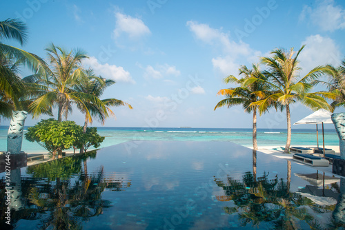 Fototapeta Naklejka Na Ścianę i Meble -  Brimless Swimming Pool in the Best Romantic Tropical Resort