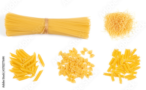 Assortment of dried pasta isolated on white background. Italian foods concept and menu design. Top view