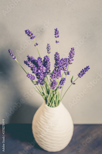 Fresh flowers of lavender bouquet on rustic wooden background