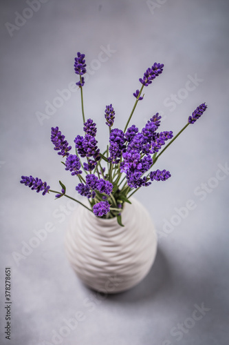 Fresh flowers of lavender bouquet on rustic wooden background