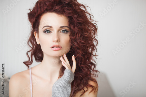 Attractive young woman indoors