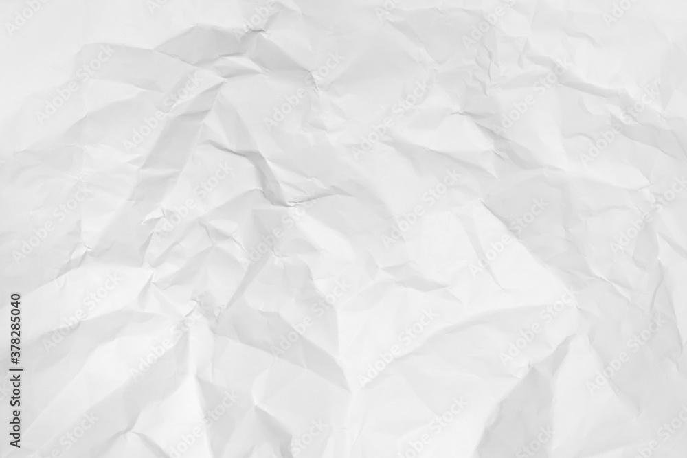 Fototapeta premium White crumpled paper texture background. 