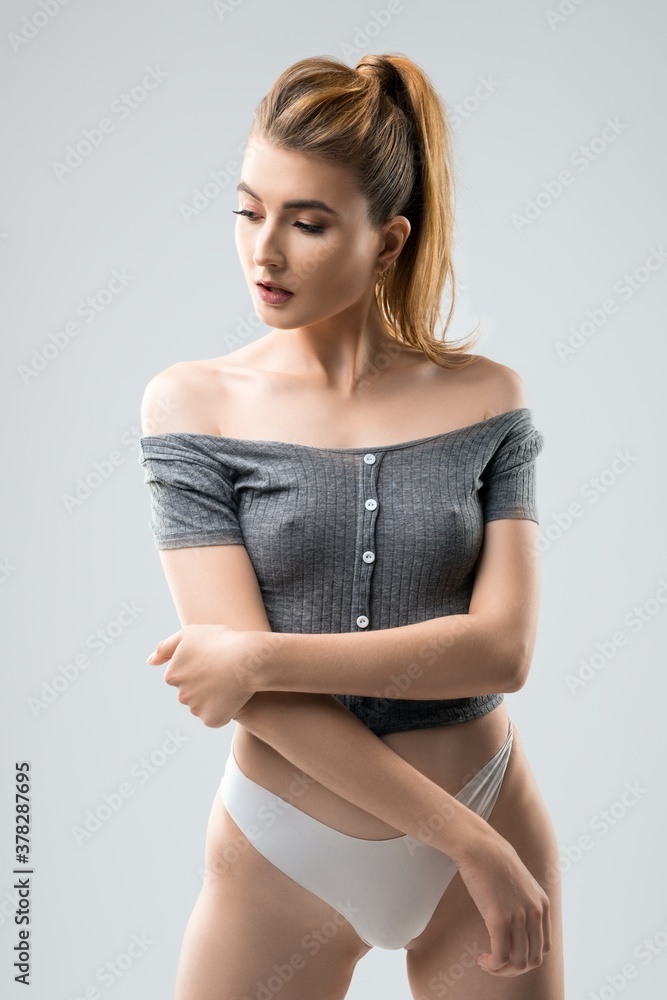 Slim woman in crop top and panties Slim woman in crop top and panties