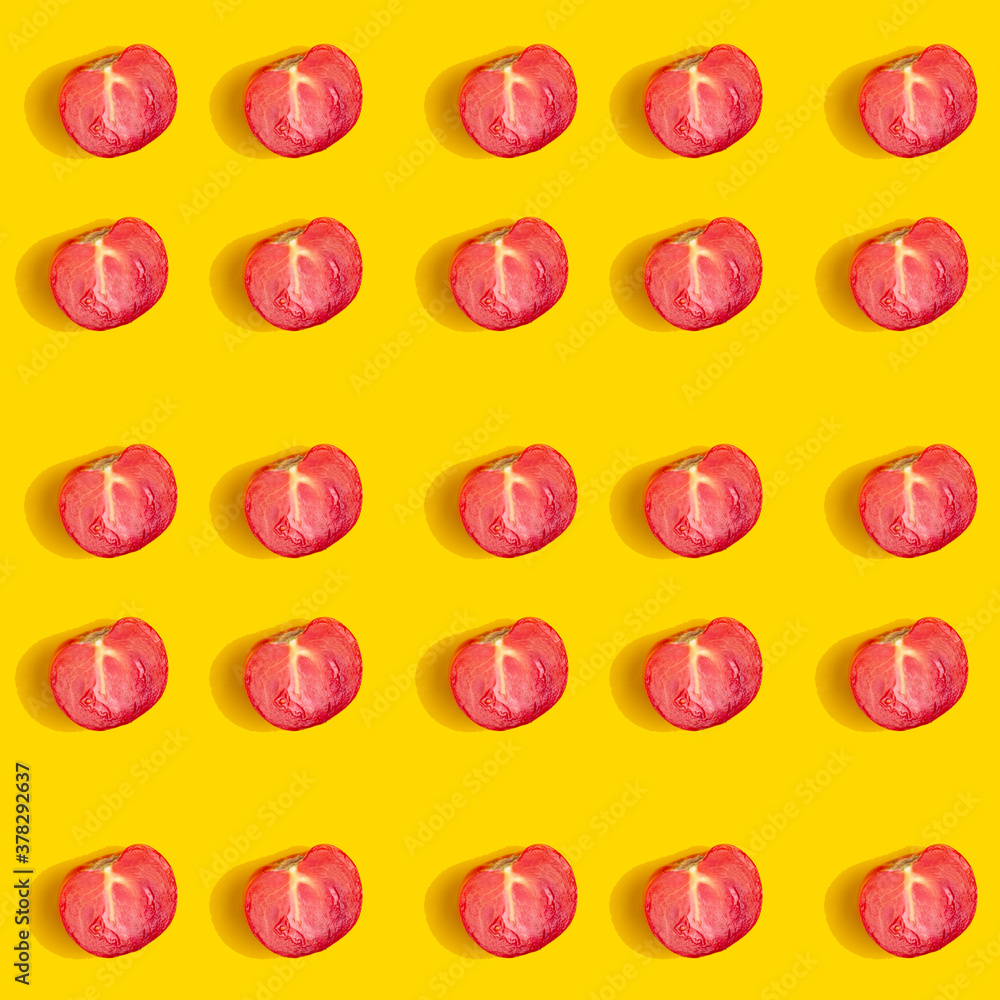 Pattern of half a tomato on a yellow background. Pattern of half a tomato on a yellow background.
