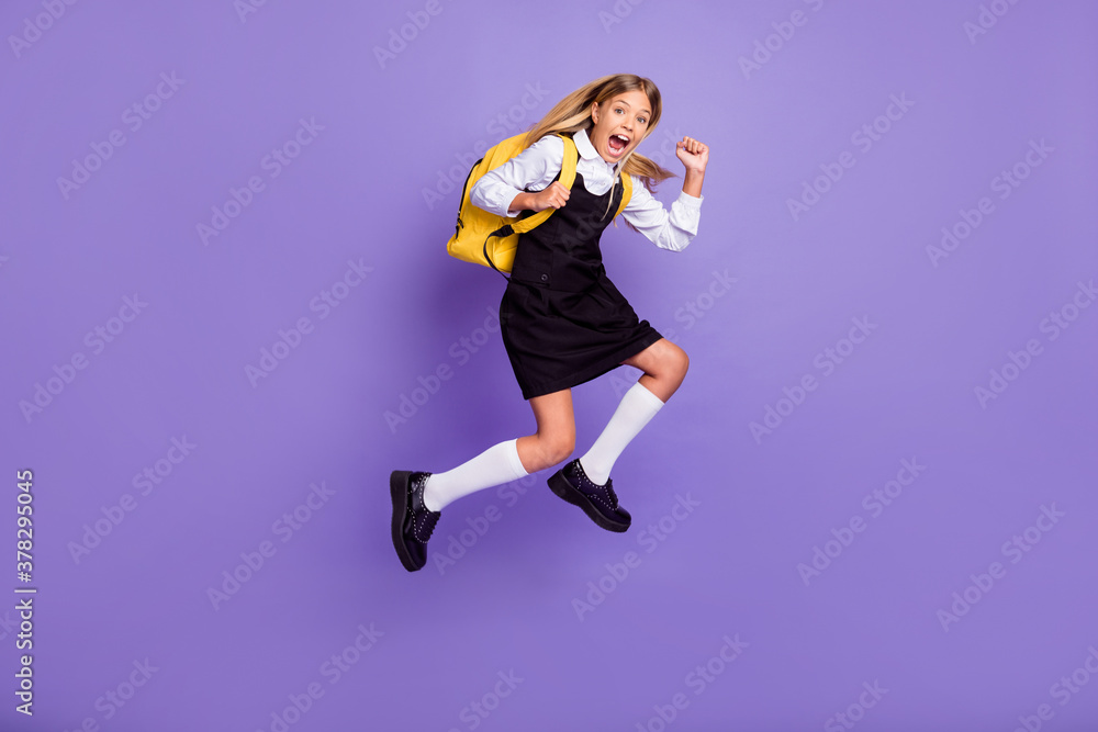 Full length body size view of her she nice attractive cheerful crazy overjoyed small little girl jumping running late lesson isolated bright vivid shine vibrant lilac violet purple color background
