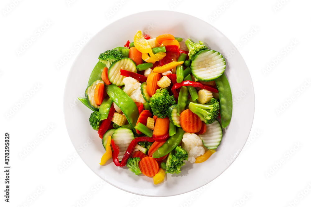 plate of stir fry vegetables isolated on a white background
