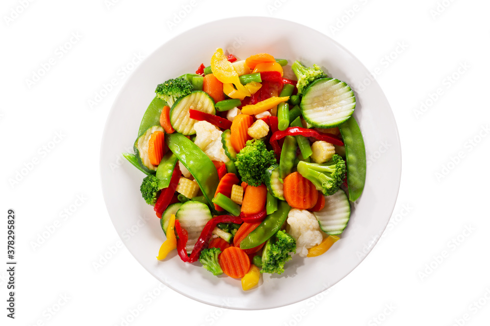 plate of stir fry vegetables isolated on a white background plate of stir fry vegetables isolated on a white background