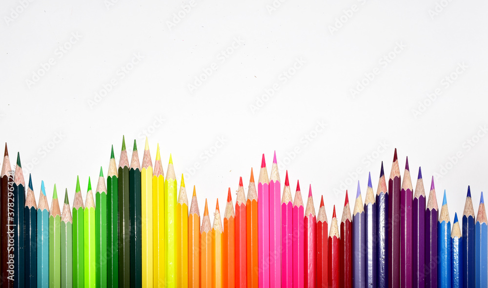 Many Color pencils isolated on white background close up. Color pencils for drawing as a background Many Color pencils isolated on white background close up. Color pencils for drawing as a background