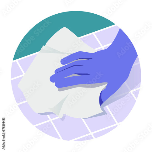 Hand in rubber gloves wiping the surfaces of ceramic tiles.