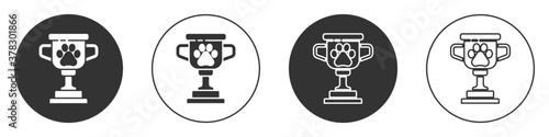 Black Pet award symbol icon isolated on white background. Medal with dog footprint as pets exhibition winner concept. Circle button. Vector.