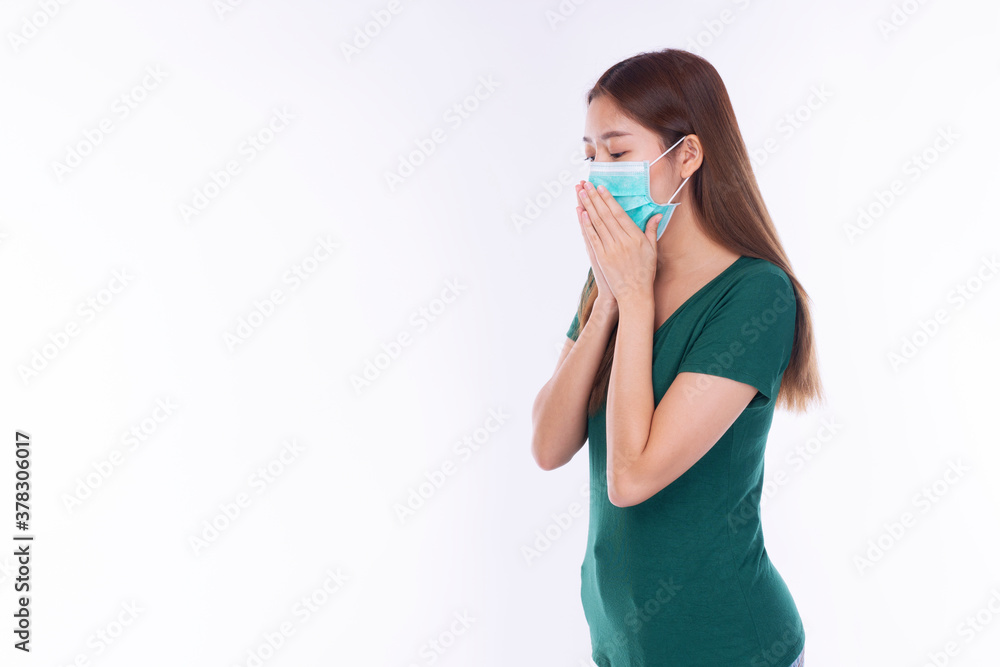 Student young woman wearing safety medical mask protection from inhaling airborne bacteria or virus disease and air pollution problem on nose over isolated white background. Health care concept. Student young woman wearing safety medical mask protection from inhaling airborne bacteria or virus disease and air pollution problem on nose over isolated white background. Health care concept.