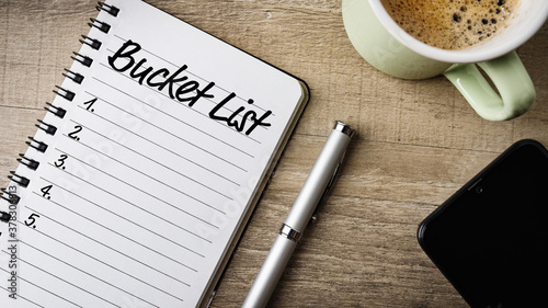 Notepad with text on it: Bucket List photo