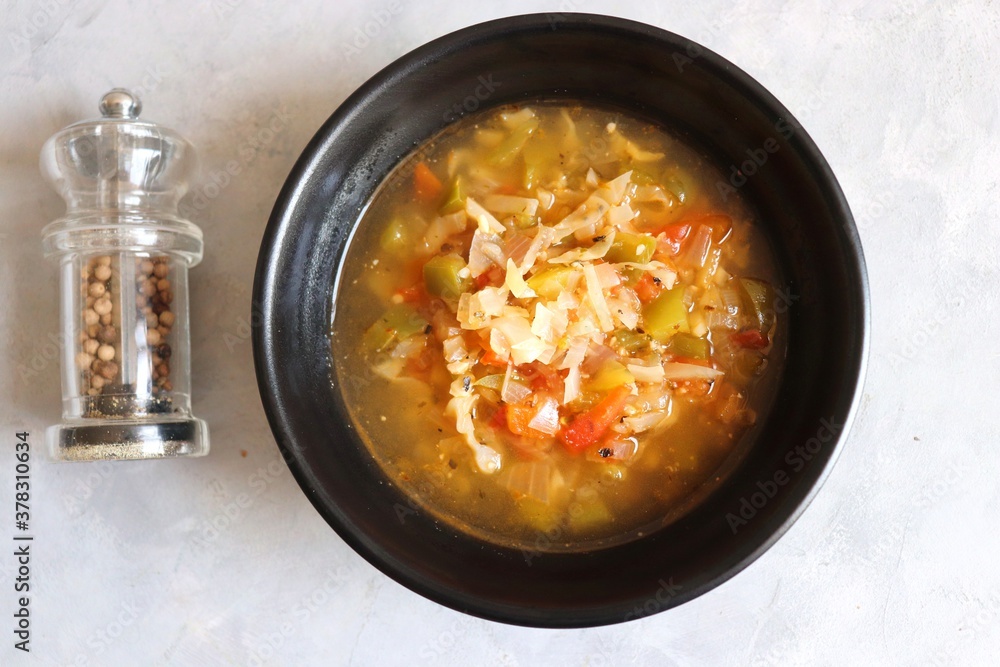 Body cleansing & detox Homemade Weight Loss Wonder Soup. veg soup made of tomatoes, capsicums, carrots, cabbage and onions. seasoned with salt and pepper. Low calorie diet vegetables soup. copy space. Body cleansing & detox Homemade Weight Loss Wonder Soup. veg soup made of tomatoes, capsicums, carrots, cabbage and onions. seasoned with salt and pepper. Low calorie diet vegetables soup. copy space.