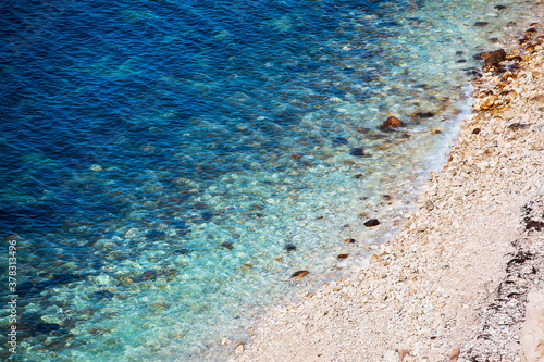 Texture of sea water. Summer background. Ocean coast.