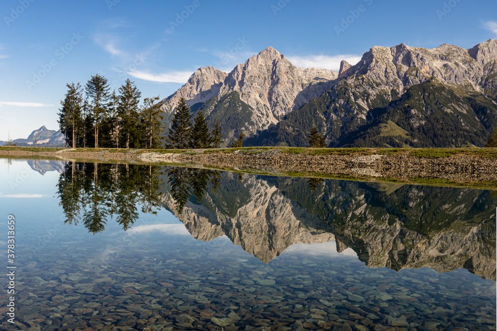 Obraz premium Reflection of mountains in Prinzensee lake at Natrun Austria