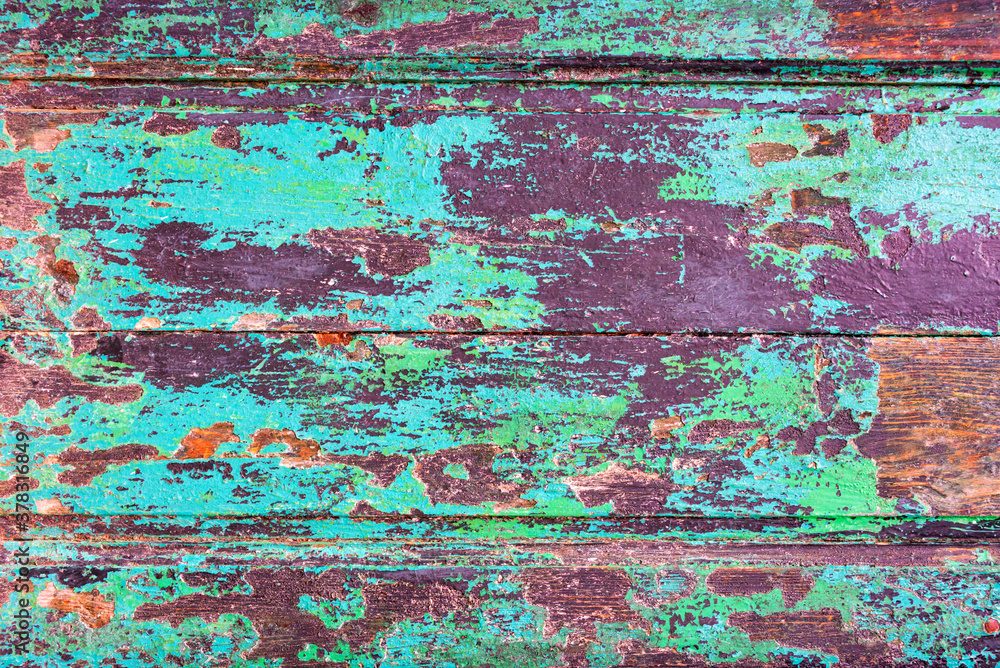 Abstract grunge wood planks texture background with peeling blue paint