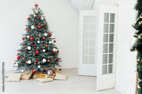 Christmas tree with pine decor gifts for new year interior background winter