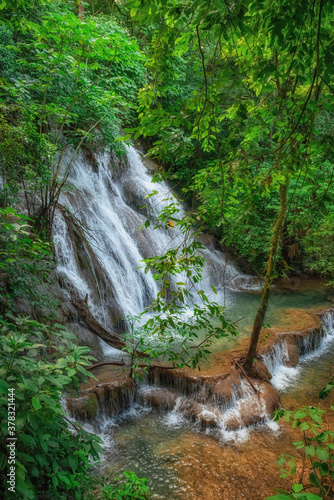 Waterfalls in the forest near archaeological site of Palenque, Mexico photo