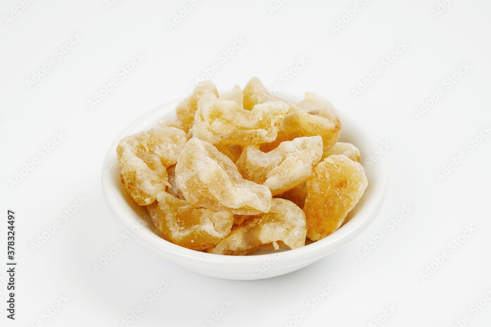 Gooseberry candy in bowl isolated on white background Gooseberry candy in bowl isolated on white background